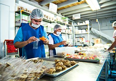 Bakers baking muffins