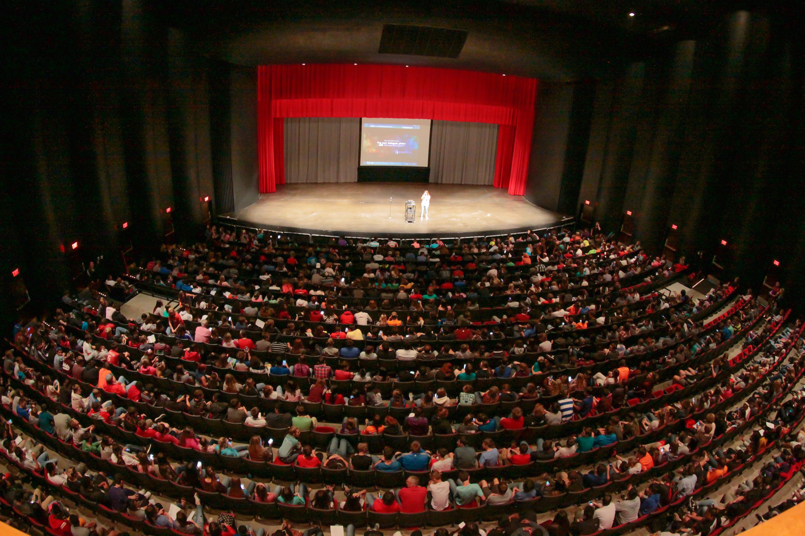 Students in auditorium for keynote